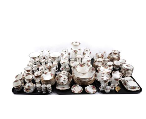 A Royal Albert ‘Old Country Roses’ pattern part tea and dinner service, items including: teacups, coffee cups, saucers, teapo