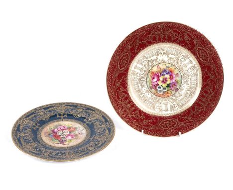 Two Royal Worcester plates, hand-painted with floral still lives and with gilded edging, signed E. Phillips and E. Barker, th