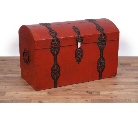A vintage Danish marriage trunk, with domed lid, painted red with floral wrought metal decoration, 105 x 57 x 63cms high, thi