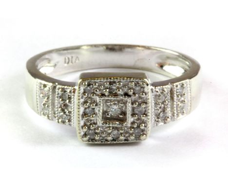 A 9ct white gold diamond set cluster ring, (k.5).