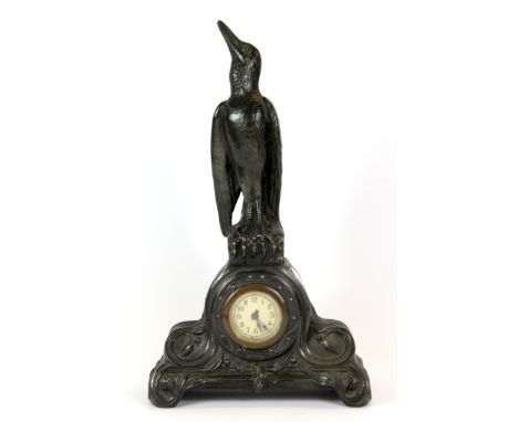 An unusual French Art Nouveau spelter mantle clock, H. 36cm.