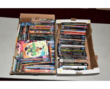 A LARGE QUANTITY OF DC COMIC HARDBACK AND SOFTBACK BOOKS, featuring Wonder Woman, Superman, Green  Lantern, Aquaman, Batwoman