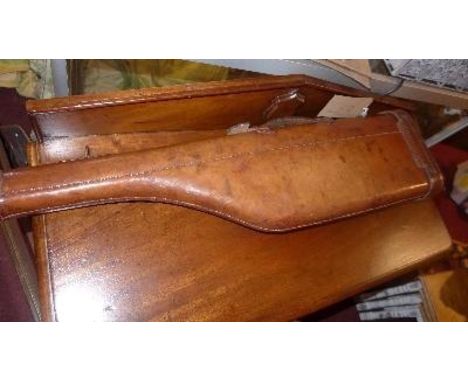 A vintage moulded leather 'leg of mutton' gun case, L.76cm 