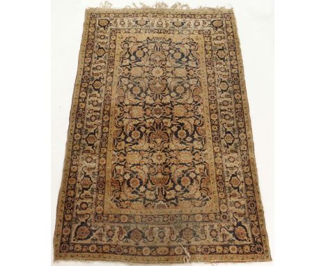 A LIGHT GROUND EASTERN RUG with allover floral design, 205cm x 130cm Condition Report: Available upon request
