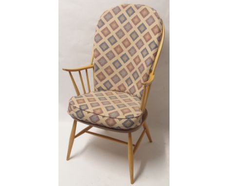 A LIGHT ERCOL CHAIRMAKER'S CHAIR 107cm high Condition Report: Available upon request