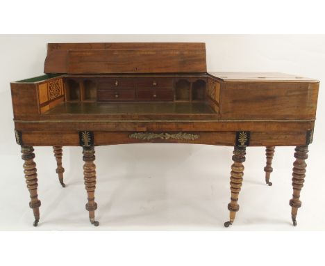 A WILLIAM IV MAHOGANY AND CROSSBANDED TABLE PIANO DESK the hinged top enclosing drawers and pigeon holes above a green skiver