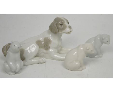 Nao; three ceramic polar bears and a larger ceramic dog (4).