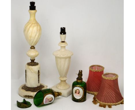 A pair of 19th century Venetian glass bottles with painted portrait panels and gilt detail and later electric light conversio