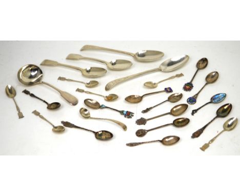 A pair of George III hallmarked silver serving spoons with chased detail to grips, Thomas Ellis, London 1783, a pair of Victo