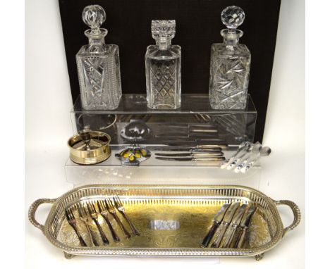 A small collector's lot to include a square-form cut decanter, two further decanters, a silver-plated tray, an AA badge, 5C62