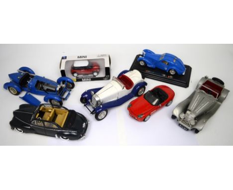 Seven diecast scale model vehicles to include one boxed example (7).