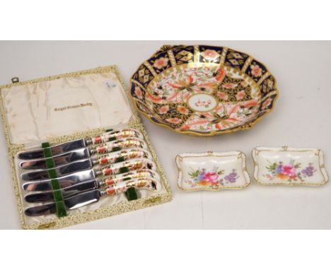 A Royal Crown Derby Imari bowl, diameter 23cm, two pin dishes and a cased set of six pistol-handled tea knives (4).   CONDITI