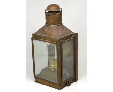 A large brass ship's bulkhead lamp from the showroom of manufacturer Wm. Harvie & Co, Birmingham, height 51cm.