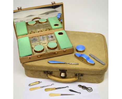 A 1960s faux leather vanity case, a Sirram beauty box with enamel lidded glass jars, three bone-handled button hooks, a small
