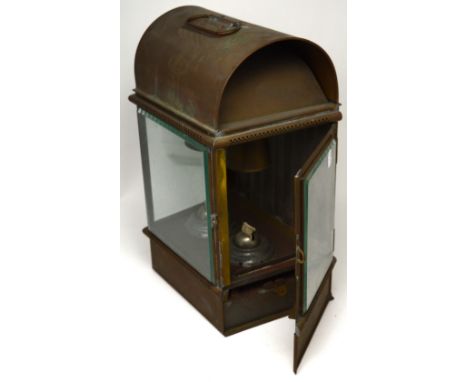 A ship's copper bulkhead oil lamp by Wm. Harrie & Co.