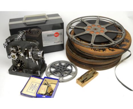 Several vintage cinema film reels in canisters to include 'Edge of the World', additional film canisters, a boxed Eumig MkS S