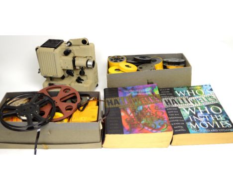 A boxed Eumig P8 automatic film projector together with a selection of 8mm film reels and spare cartridges, two paperback vol