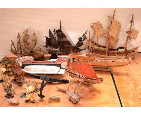 A box of partially complete scratch-built model galleons, yachts etc, a ship-form table lamp and other maritime-related artic