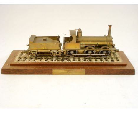 A hand built brass model of the 0-6-0 London and South Western Ilfracombe Goods locomotive and tender modelled by A Rawson an