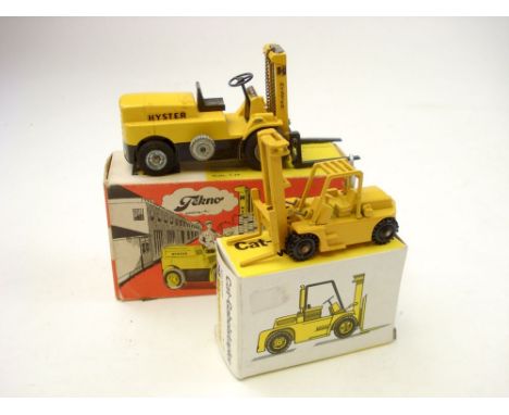 Tekno No 864 Hayster Fork Lift:, in yellow , driver missing, boxed, together with an NZG no 124 Caterpillar Fork Lift (2).