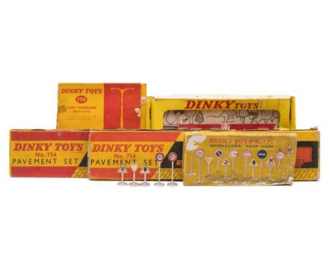 Dinky International Road Signs (771):, a later French set of road signs (593), a Double Arm Lamp Standard (756)  two Pavement
