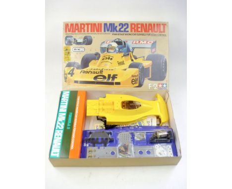 A Tamiya 1/10th scale Martini MK.22 Renault kit:, No RA1014, yellow body components and tyres in original inner packing card 