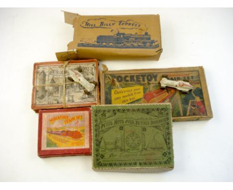 A Crescent Toys 'Miniature Railway Set:, together with a tinplate clockwork 'Hill Billy Express', a Pocketoy 'Mechanical Trai