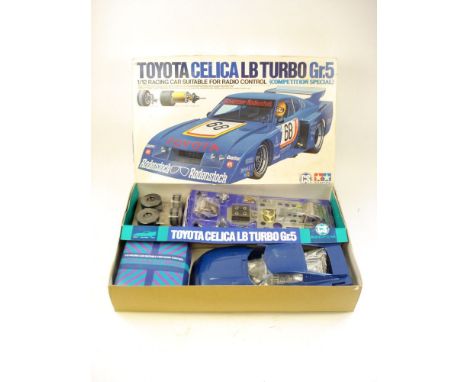 A Tamiya 1/12th scale  Toyota Celica LB Turbo GR.5 (Competition Special) radio control kit:, no RA1209m blue body, components