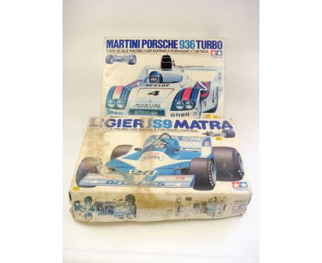 Tamiya 1/12th scale model radio control Martini Porsche 936 Turbo:, and a Tamiya 1/10th scale Ligier JS9 Matra, (not checked 