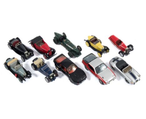 A group of 1/43rd scale white metal cars:, including a Tin Wizard No 103 Porsche 924 Carrera GT.