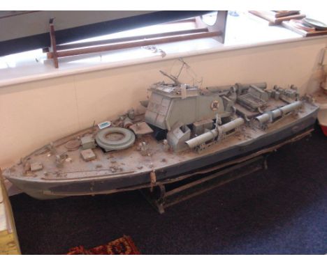 A radio control scale model of a Vosper Motor Torpedo Boat:, with wheel house, detailed deck with four torpedo tubes and forw