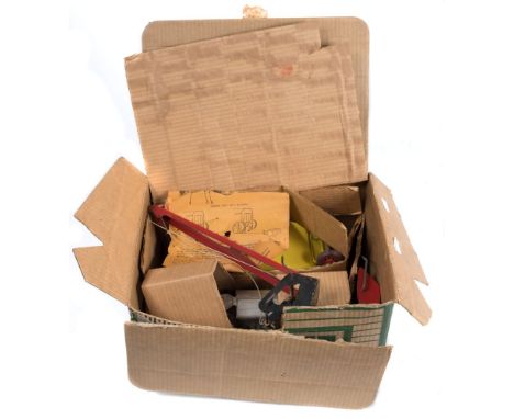 Louis Marx & Co Inc (USA) a tinplate clockwork tractor and accessories in a cardboard 'Shed' box:, comprising aluminium tract