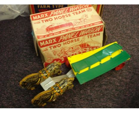 Marx Toys (USA) a battery operated Tricky Tommy 'The BIg Brain' Tractor:, in red and yellow plastic with moveable driver figu