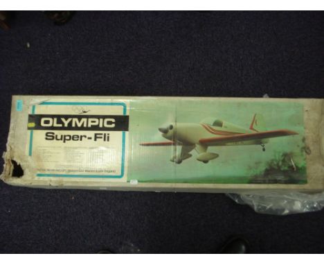 Three scale model flying aircraft kits:, an Olympic Super-Fli, a Kamco Kittiehawke and a Vernon Fournier RF5 (3) (unchecked f