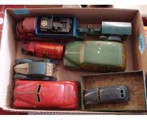 Gama, Tri-ang, Mettoy and others:, a group of various tinplate clockwork vehicles including a Shell petrol tanker and a US Ar