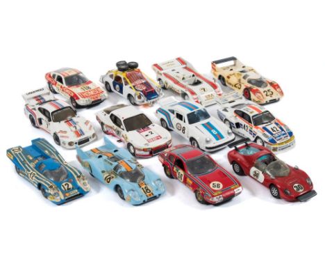 A group of 1/43rd scale racing cars:, various makers, mainly Porsche cars including four Porsche 917 variants. 