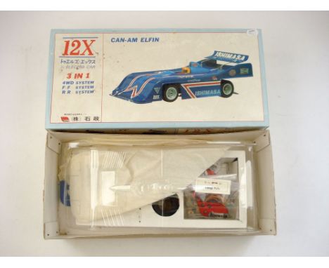 An Ishimasa (Japan) 1/12th scale model Can-Am Elfin electric radio control car:,  clear plastic body , chassis and components