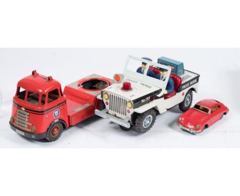 Daiya (Japan) a battery operated Police Patrol Jeep:,  with flashing light , siren and stop sign, white and black with lithog
