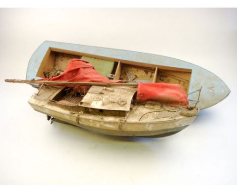 A radio control scale model of a yacht:  together with one other model hull (2)