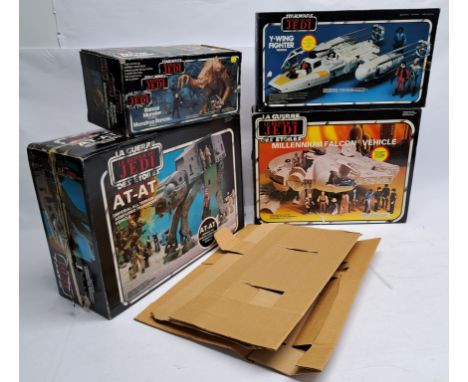 Assortment of vintage Palitoy Star Wars empty boxes. Including ROTJ Battle Millennium Falcon, AT-AT (with inserts), Rancor Mo