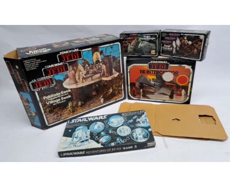 Assortment of vintage Palitoy Star Wars empty boxes. Including ROTJ Ewok Village, Tie Interceptor (plus inserts), Ewok Combat