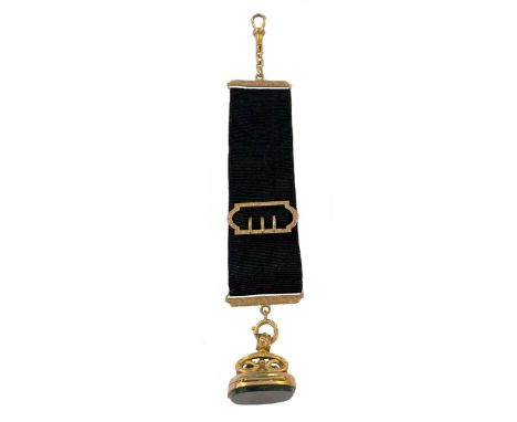 the fob of traditional rectangular form with scrolled supports and vacant bloodstone seal set within a piano hinged frame, in