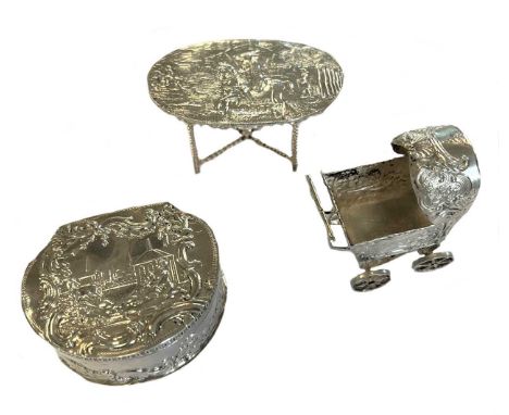 the first, a miniature table, stamped 930 together with London import marks for Sterling silver, 1899, with sponsor mark of I