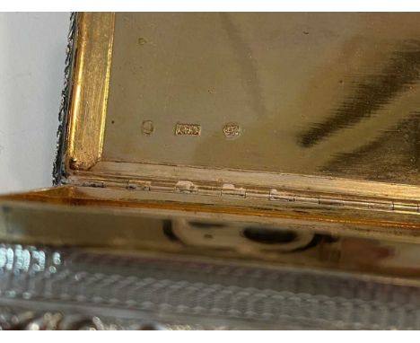 Birmingham 1834, of rectangular form, engine turned concave sides between applied cast foliate borders, piano hinged cover wi