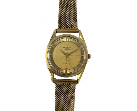 circa 1960, the signed circular 'crosshairs' champagne dial, 30mm diameter, with gold coloured batons on a textured outer rin