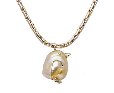 the natural colour baroque pearl pendant is in the form of a penguin, with applied yellow metal features, jump ring bale, len