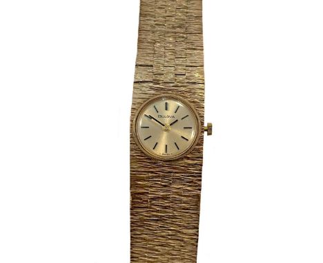 circa 1971, the signed circular champagne dial, 14mm diameter, with black batons and hands, signed but unnumbered 17 jewel me