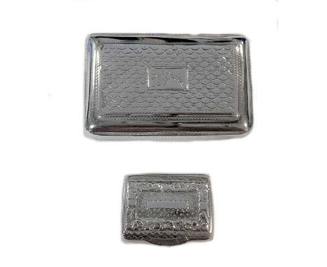 the snuffbox, Birmingham 1818, of rectangular form, decorated all over with engine turned engraving, part marked piano hinged