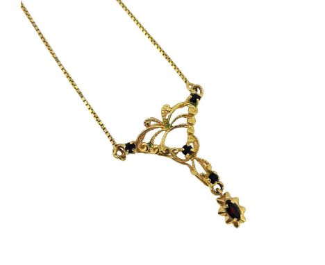 pierced and textured panel, set with four round faceted garnets, and suspending an oval faceted garnet dropper, attached to a