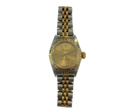 circa 1988, model number 67193, serial number R430302, the signed circular champagne dial, 20mm diameter, with gold coloured 